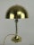 Solid brass, mirror polished table lamp from the 1920s Total height: 32 cm Diameter of the shade: 20 cm Diameter of the...