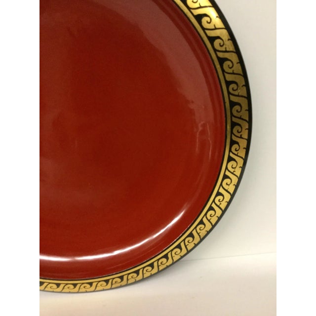 A beautiful example of the handcrafted quality of Thailand in the 70’s. 24 K gold trim is Hand Painted over rich coral or...