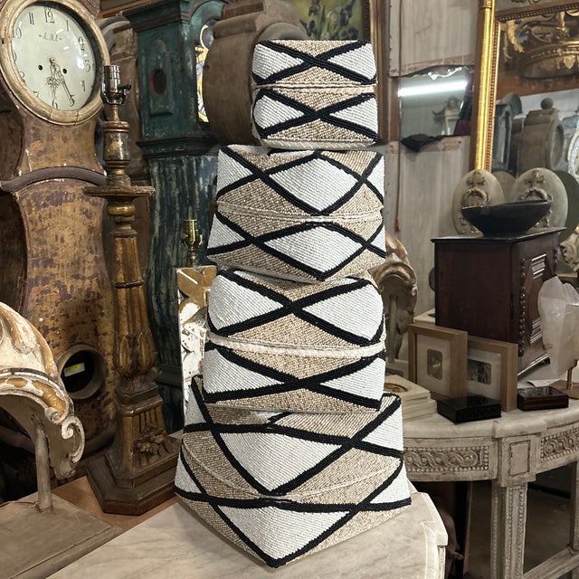 A set of four nesting baskets from the late 20th century, Thailand. These four nesting boxes are absolutely stunning with...