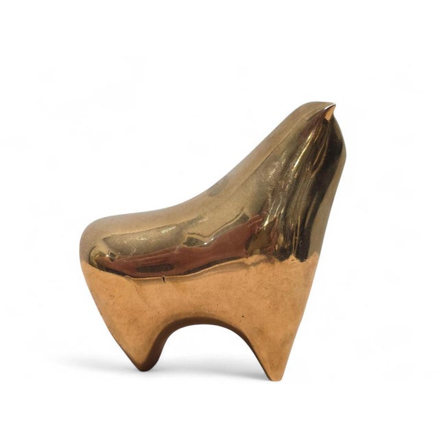 Striking modern bronze sculpture depicting a bull, a subject long associated with strength, power, determination, and...