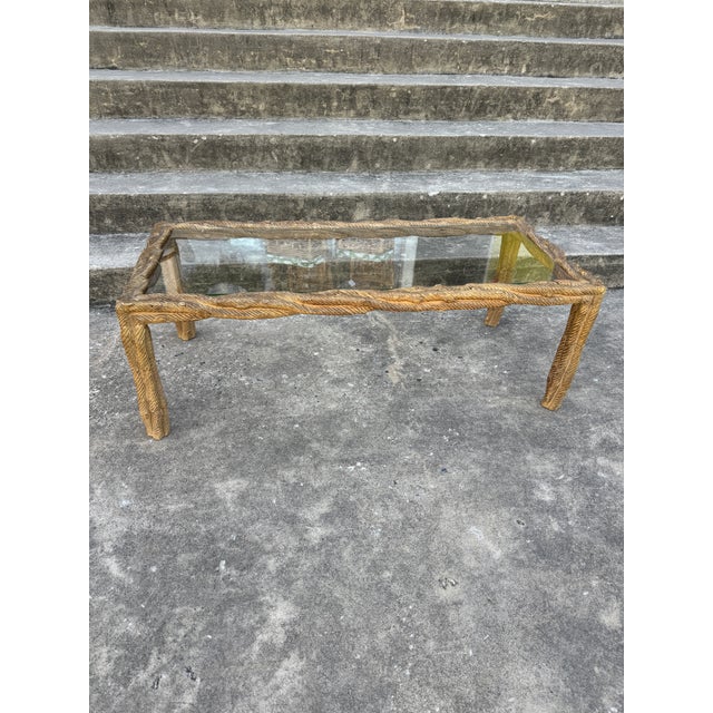 Amazing and unique faux bois coffee table in a natural wood tone. Super condition. Light scratches to glass.