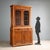 Late 19th-century walnut sideboard from Italy, featuring an elegant and functional design. The hutch has a pair of glass...