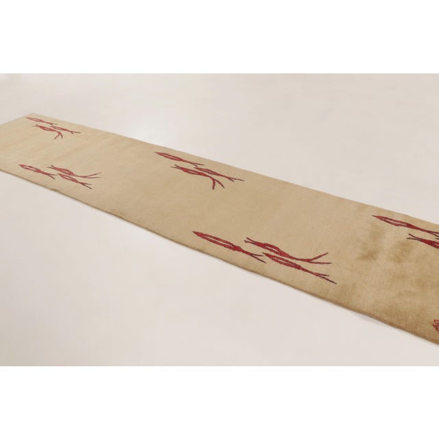This 3x13 vintage Art Deco runner from 1940, is a rare and unique modernist oriental rug, distinguished by an ivory open...