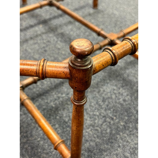 A striking eight-legged base with intricate lattice interior supports.Blends beautifully into Hollywood Regency, Palm...