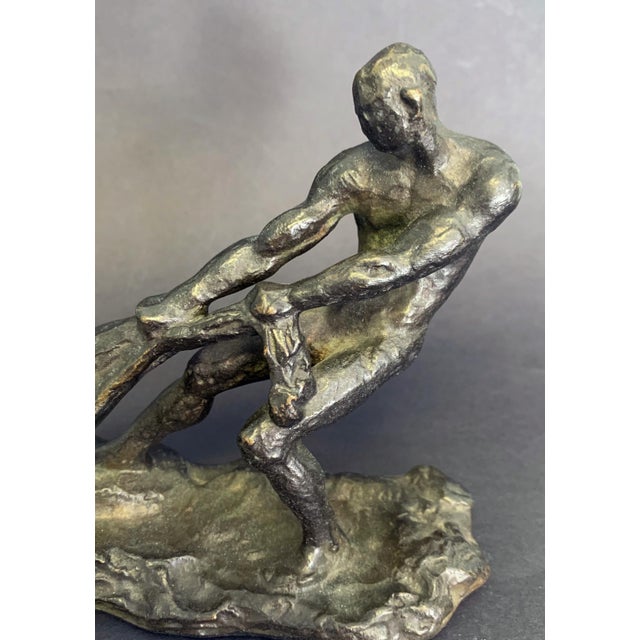 This powerful bronze -- depicting a nude fisherman hauling in his net -- is a superb example of Art Deco sculpture...