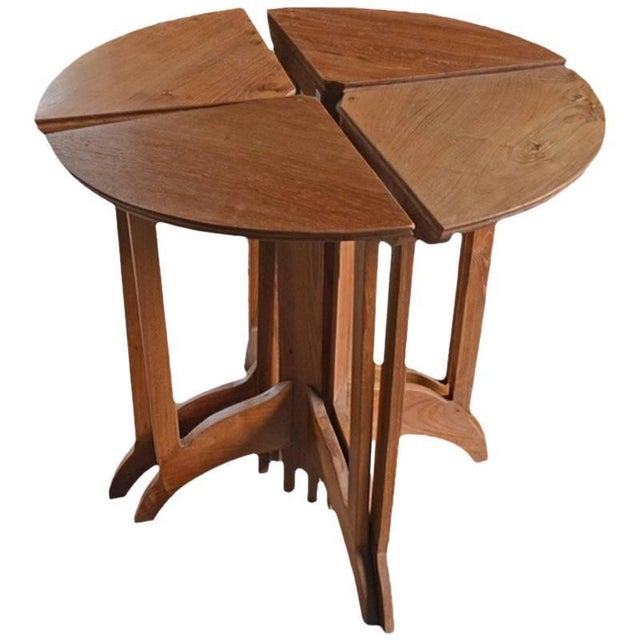 Art Deco teak wood side table in four sections. Total diameter when placed together is 29.5" or they can be used as four...