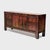This antique Chinese sideboard from the early 20th century balances a streamlined silhouette with textured, wabi-sabi...