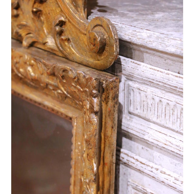 18th Century French Regence Carved Giltwood Wall Mirror With Cherub Crest For Sale - Image 9 of 11
