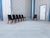 Featuring dramatic sweeping lines and sculpted organic frames, this set of six mid-century modern dining chairs brings a...