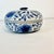 Vintage Home is pleased to offer this pretty hand-painted Chinoiserie Hollywood Regency lidded box. The round design is...