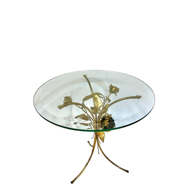 Vintage Italian gold tole end table. Three roses with lots of leaves all joined together in the center. Beveled glass top...