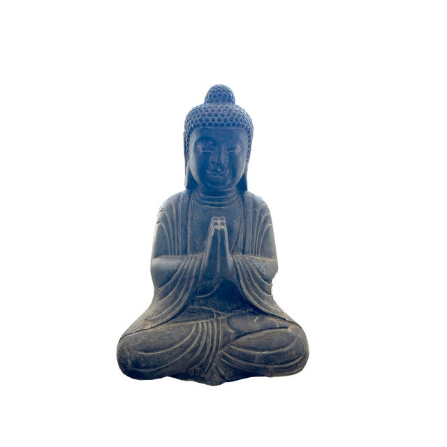 This exquisitely crafted meditative Buddha statue captures a profound sense of tranquility and inner peace. Seated in a...