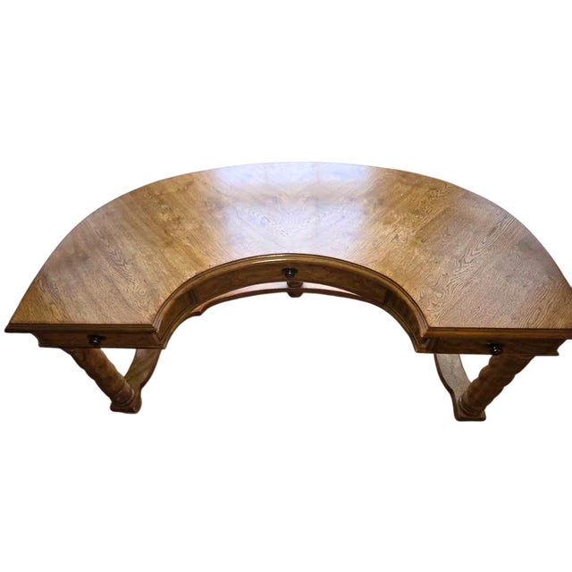 Gorgeous solid oak demilune executive desk by Drexel, mid to late 20th century. Superb condition.