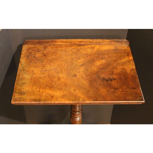 Late Regency circa 1820 adjustable height reading table or music stand, English. Integral reading rail. Highly figure...