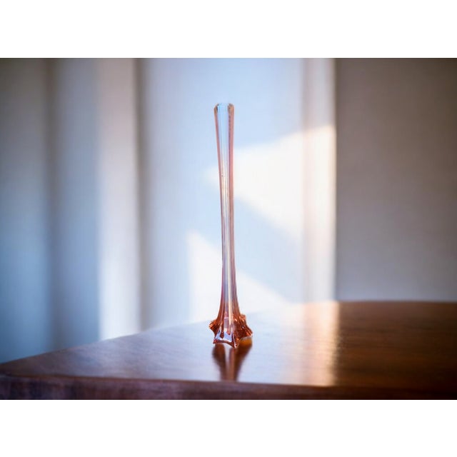 A monumental Mid-Century American swung art glass floor vase in authentic cranberry (gold ruby) glass, standing an...