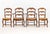 Set of Four French Provincial Style Walnut Dining Chairs, two armchairs and two side chairs, each with rush seat and...