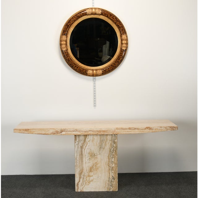 gorgeous faux-painted tortoiseshell and gold gilt acanthus leaf-designed mirror. The acanthus leaves are made of carved...