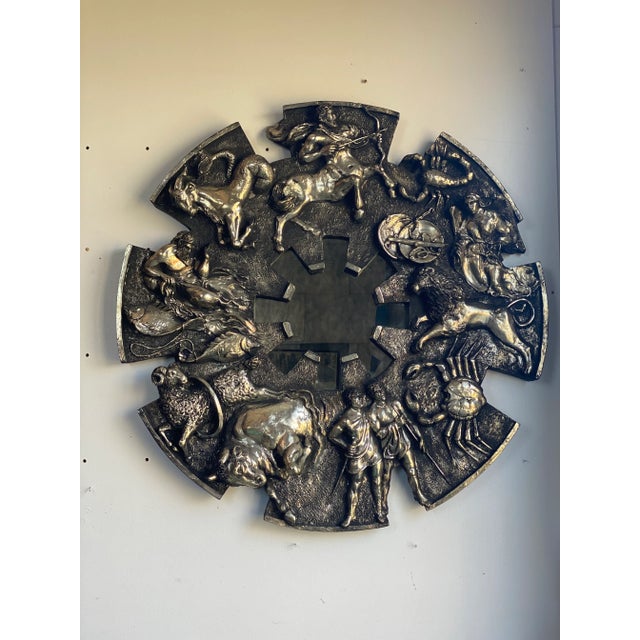 Three Dimensional Cast Resin Mirror - striking sunburst shape image of the Zodiac in Bronze or Gold Tone. This Mid-Century...