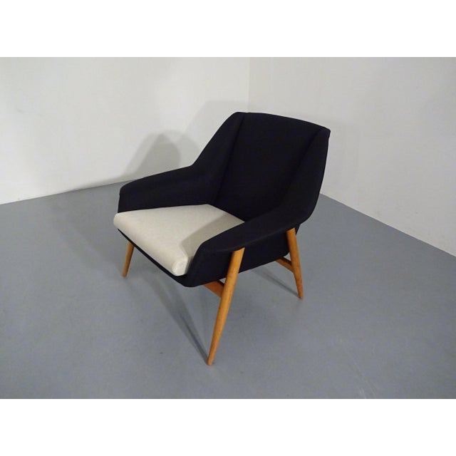 Cassina armchair from the 1950s. Design: Wilhelm Knoll. Reupholstered in black/beige. I have official proof of...