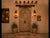 This Antique Indian Bleached Teakwood Door features an arched crown and beautifully hand-carved detailing throughout....