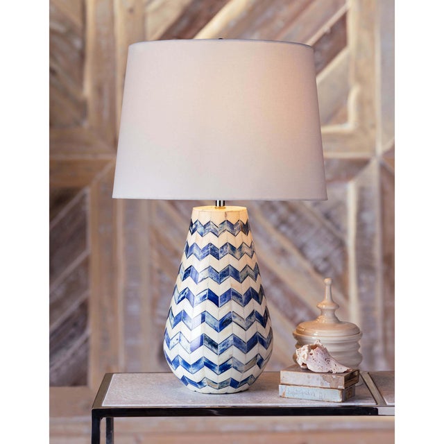Pattern play: The complex inlayed bone pattern is hand made but at the same time so chic. This boho style lamp makes an...
