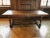 This table was used in the reception of the Embassy of France in Berlin. It is made of solid oak and has a spacer. Leg...