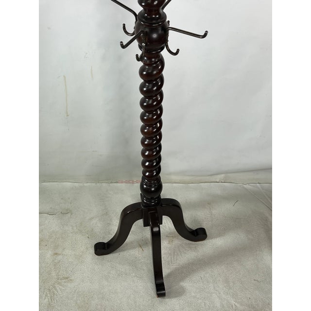 For sale is this very nice vintage coat stand made out of mahogany.