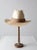 This vintage straw cowboy hat showcases a natural woven design with a tall crown and a belted woven hatband. Its...