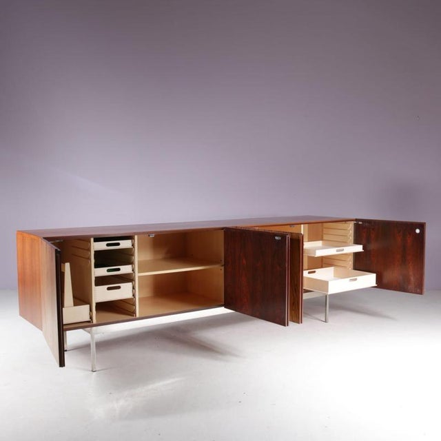 A fantastic large sideboard designed by Dieter Wäckerlin, manufactured by Behr in Germany in the 1950s. Made of high...