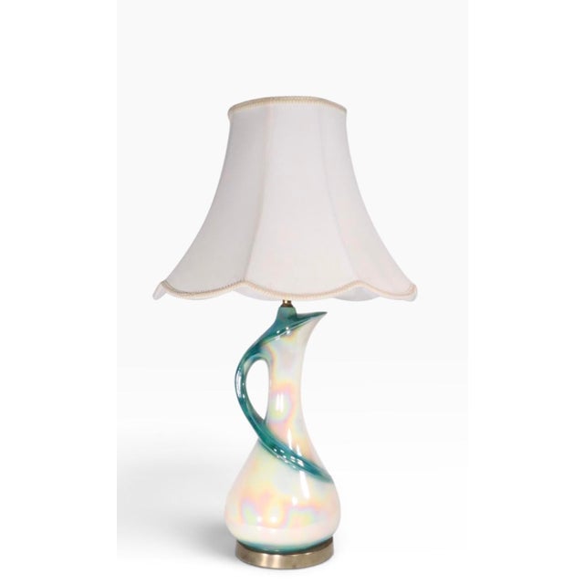 Sexy Mid Century, Hollywood Regency style ceramic table lamp, in excellent, original, clean and working condition. The...