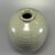 Fine antique Chinese celadon ribbed meiping vase. Classic tapered silhouette with raised horizontal ribbed decoration,...