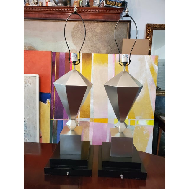 A large and fine pair of architectural diamond shaped silver leaf lamps. All hand crafted circa 1970s with an ebonized...