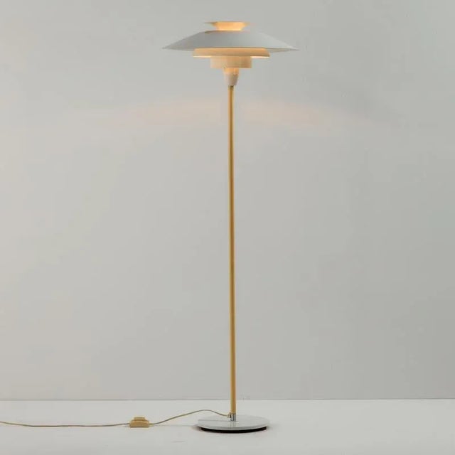 Danish ‘Typ: 1044-G’ aluminium floor lamp from the 1980s produced by Frandsen. The surface of the lamp has scratches,...