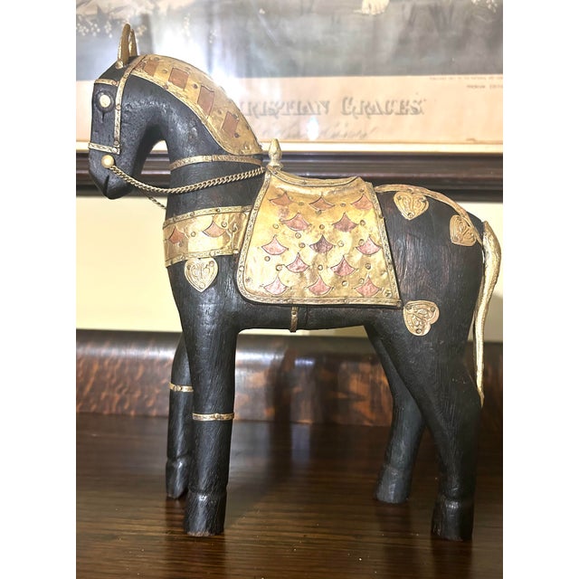 If you love horses, shiny metals and one-of-a-kind, hand-carved pieces, made by skilled artisans—here is a mid-century...