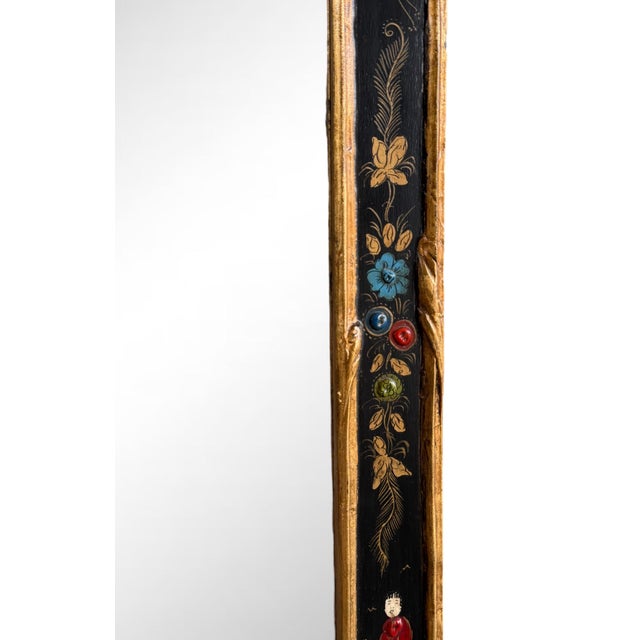A Georgian Style black chinoiserie wall mirror finely crafted by Friedman Brothers. Carved and finished by hand, Colorful...