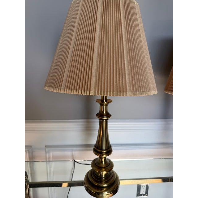 Elevate your space with this elegant pair of vintage Stiffel table lamps, crafted in the USA and known for their...