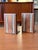 A beautiful matching pair of walnut block bookends with ceramic inlays designed by Gordon & Jane Martz for Marshall...