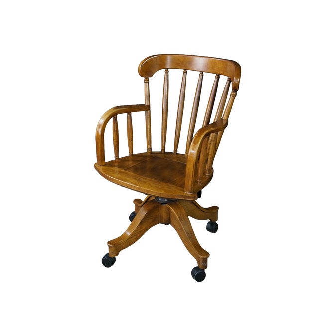 This exceptional vintage Victorian Revival Windsor-style swivel desk chair is crafted from solid oak, seamlessly blending...