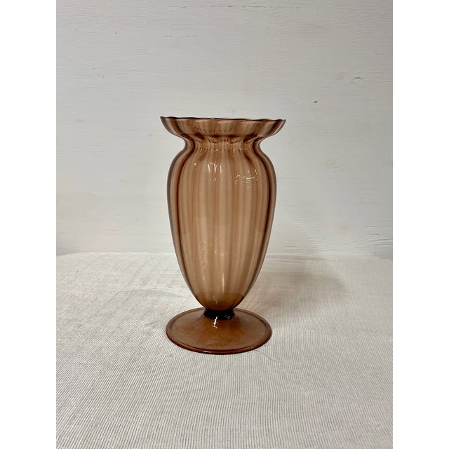 Vintage Murano glass vase The vase is made of hand-blown amethyst-colored glass with a ribbed design. The style is...