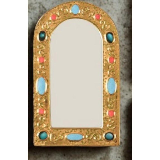 Glazed ceramic arched wall mirror by the French ceramicist Francois Lembo, Vallauris, circa 1970s. The arched frame is...