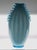 This vase has many characteristics of the production of marinuzzi zecchin vases. It is a shaded ribbed with the typical...