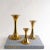 Elegant set of three vintage brass candlestick holders with a fluted design. Varying in height to create an attractive...