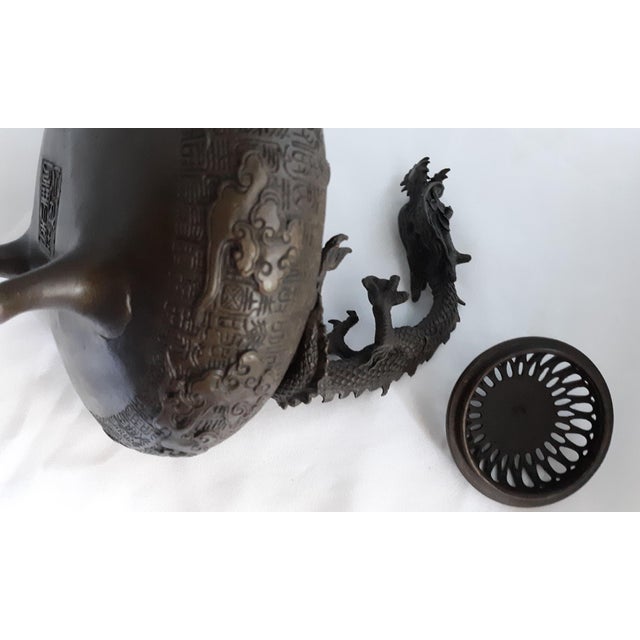 Vintage Chinese Bronze Tripod Censer With Pierced Lid and High-Relief Dragon Handle For Sale - Image 4 of 5