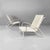 Italian mid-century outdoor white and azure iron armchairs, 1960s. Pair of outdoor armchairs in white painted iron. The...