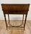 This is an elegant Regency-style writing table / bureau plat with superstructure, crafted in richly figured mahogany Also...
