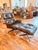 This Eames 670/671 lounge chair and ottoman set is an authentic example in Brazilian rosewood. It was designed by Charles...