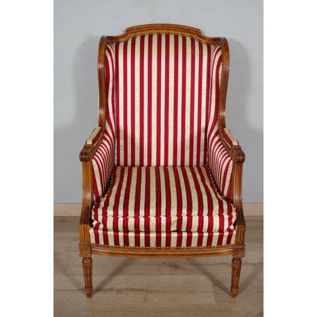 Wood Early 20th Century French Louis XVI Style Walnut Bergères à Oreilles with Fluted Legs - A Pair For Sale - Image 7 of 12