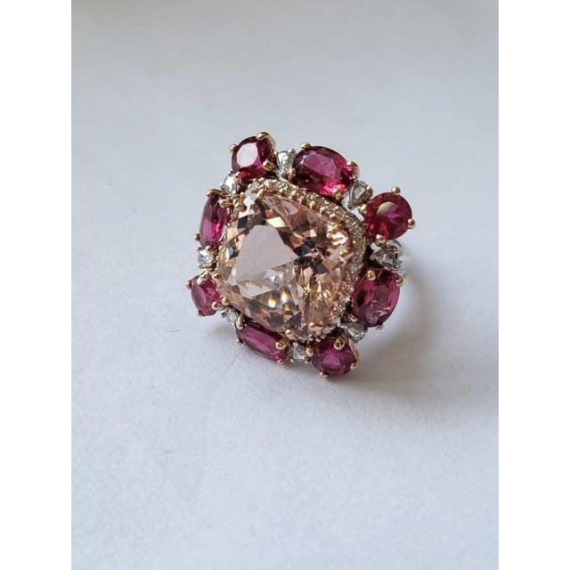 A very gorgeous and one of a kind, Morganite & Rubellite Cocktail Ring set in 18K Rose Gold & Diamonds. The weight of the...