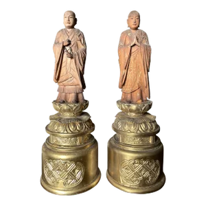 A Pair of Antique Japanese Taishō Carved Zushi Monks on Gilt Bases
