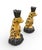 Hand-painted with a vibrant tawny glaze and classic black rosettes, each leopard sits poised atop a lush, dark-bronze-...